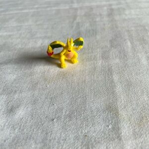 Charizard Yellow Dragon Figurine with Green and Red Accents